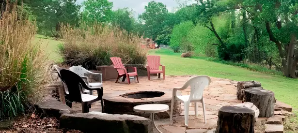 Lakefront home outdoor area with fire pit